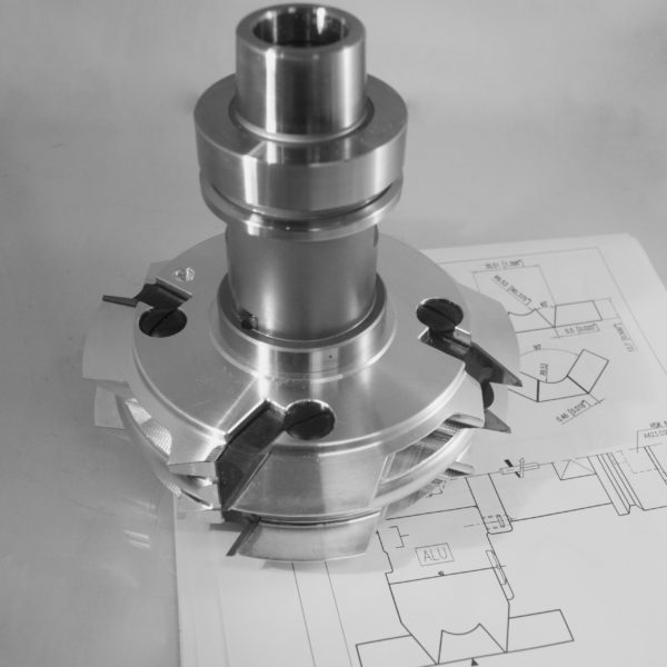 CNC precision collet chuck assembly with black adjustment screws displayed on technical engineering drawings