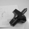 Precision machined metal tool holder or cutting tool insert positioned on detailed engineering drawings and technical schematics with dimensional specifications